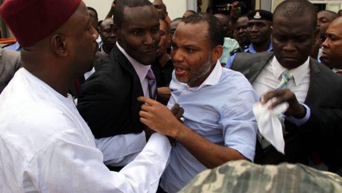 Radio Biafra Director, Nnamdi Kanu being pushed and shoved by DSS officials at the court house, Monday, November 23, 2015 | Facebook
