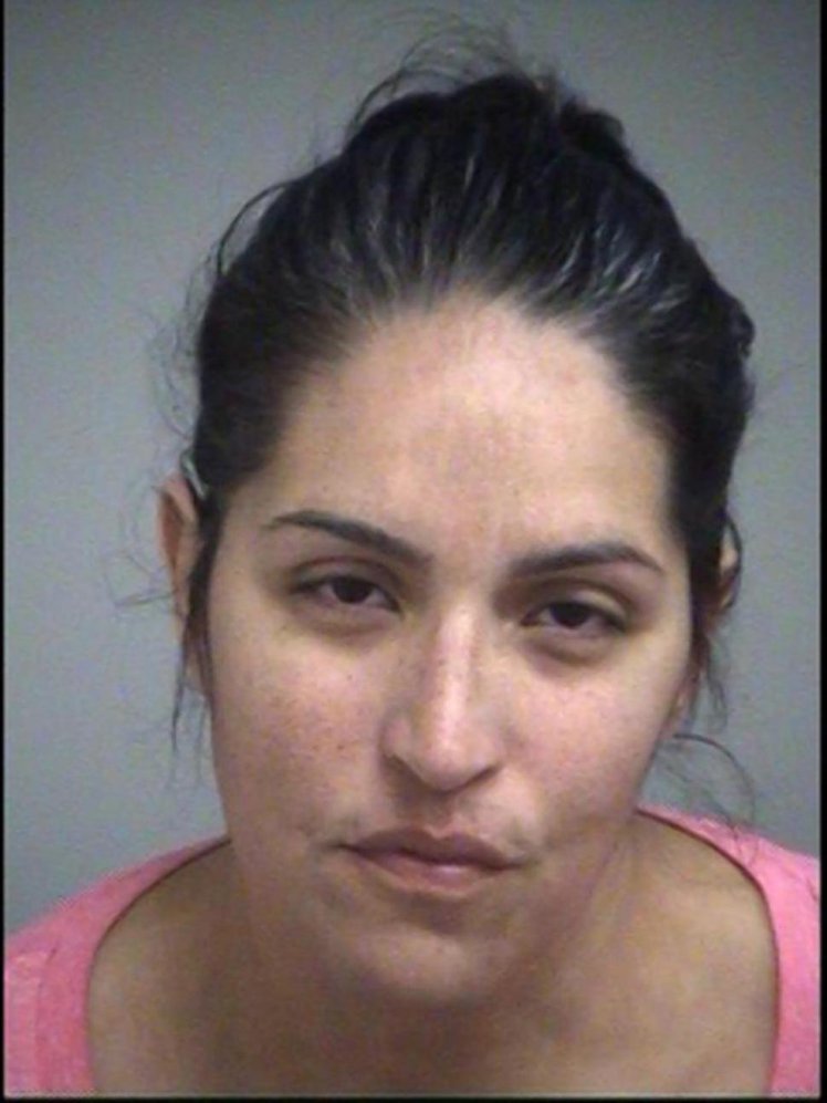 Kimberly Marie Reid, day care worker arrested for attacking a child