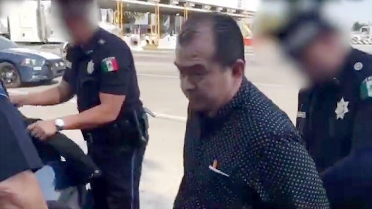 Police arresting Juan Vicente Hernandez Leon | CEN