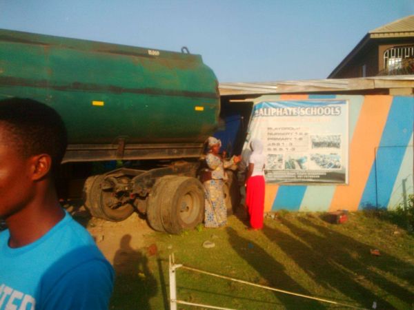 The trailer after it rammed into the school building on evening of Monday, April 18, 2016 in the Orusumbare area of Idimu, Lagos. | Ubani Michael/News Express
