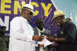 Deputy Governor of Bayelsa of Bayelsa State, Rear Admiral Gboribiogha John Jonah rtd, (left) receiving the report from the Chairman of staff verification Committee for Brass Local Government Area, Senator Inatimi Rufus-Spiff (right) during the monthly Transparency Initiative Press Briefing at the Chief DSP Alamieyeseigha Memorial Banquet Hall, Government House, Yenagoa, while the Special Adviser to the Governor on Treasury, Revenue and Accounts, Mr. Timipre Seipulo (centre) looks on | Lucky Francis
