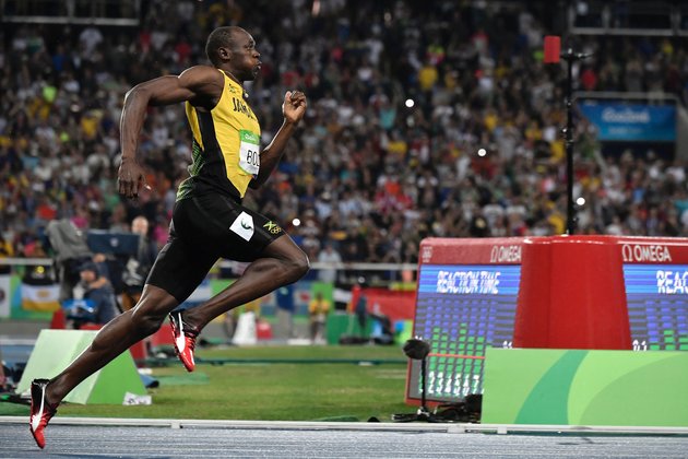 Jamaica's Usain Bolt competes in the men's 200m Final during the athletics event at the Rio 2016 Olympic Games at the Olympic Stadium in Rio de Janeiro on August 18, 2016. | Jeff Pachoud/AFP/Getty Images