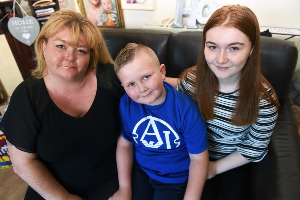 Leanne Owen found out son Harry had a hidden vagina when he was eight years old IMAGE: MERCURY PRESS Harry was diagnosed with rare condition bifid scrotum and urethral duplication in May 2015 IMAGE: MERCURY PRESS Harry was born with a number of defects including no anus, no urethra hole in his penis and three holes in his heart IMAGE: MERCURY PRESS Harry, who also has severe dyspraxia, has undergone more than 12 operations and has also been given a colostomy bag IMAGE: MERCURY PRESS Leanne alleges many of Harry's defects were not picked up through ultrasound scans at Blackpool Victoria Hospital before he was born IMAGE: MERCURY PRESS Leanne, who is also mother to 16-year-old daughter Millie Bracewell, feels frustrated Harry's condition wasn't picked up on before he was born | Laura Sheperd/Mercury Press