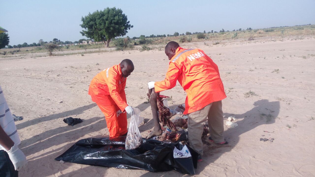 Emergency workers take away the body of the suicide bomber killed on Sat, Nov 19, 2016 | PR Nigeria