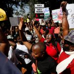 Demonstrators protest against U.S. President Donald Trump during the Women’s March inside Karura forest in Kenya’s capital Nairobi