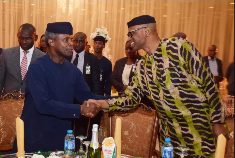 Governor Olusegun Mimiko of Ondo State greets Acting President Yemi Osinbajo at a dinner held in honour of Mimiko at the Presidential Villa