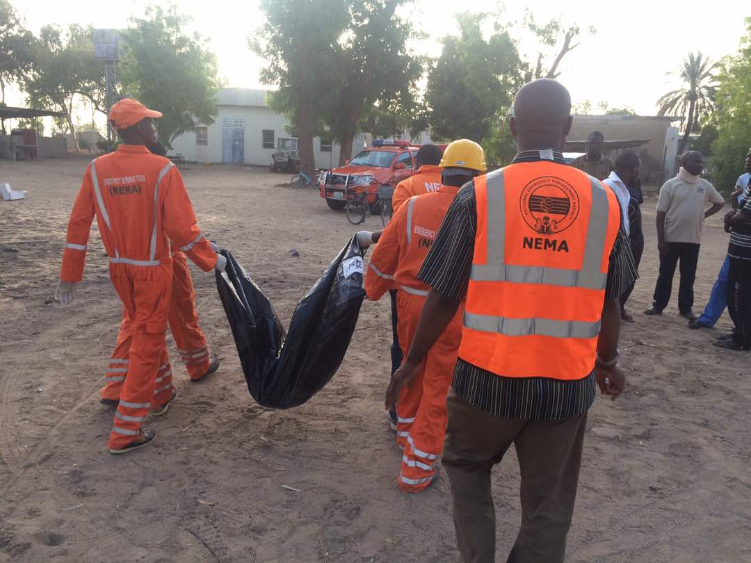 Emergency workers clear the scene of a suicide bomb attack in University of Maiduguri on Saturday, May 13, 2017 | PR Nigeria