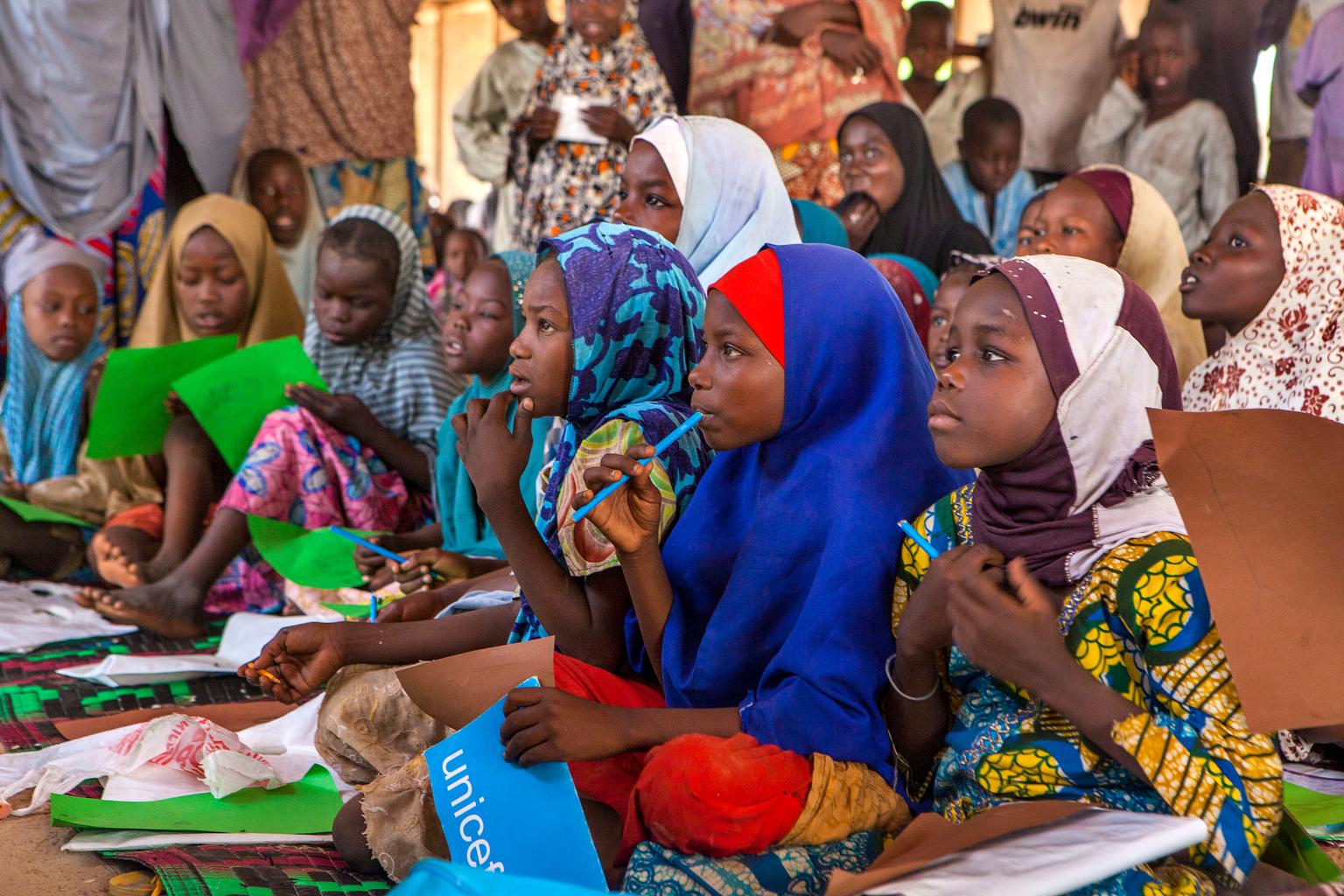 Children play with a ball during a recess at a UNICEF nigeria borno school schoolchildren nigeria