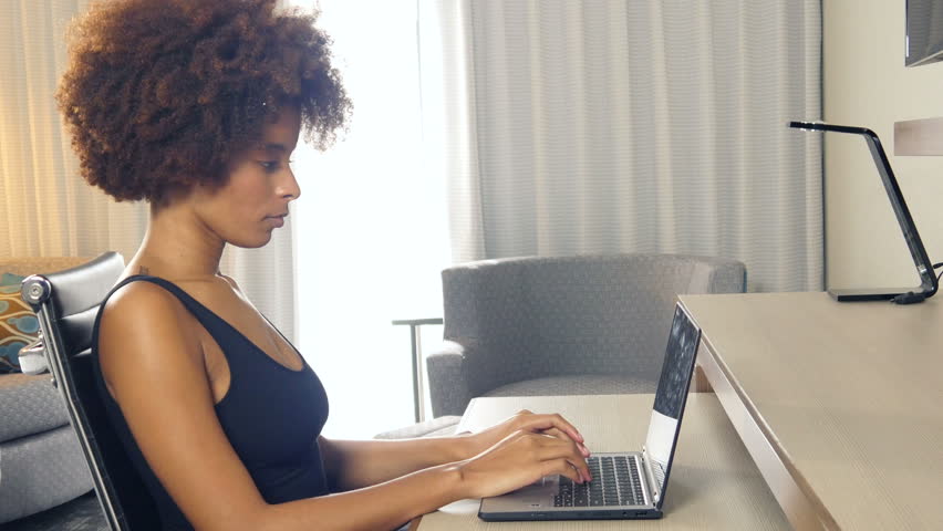 essay laptop writting woman