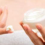Skin Care. Moisturizing Cream In Female Hands