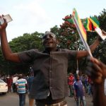 Zimbabweans celebrate after Mugabe resigns in Harare