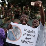 Zimbabweans celebrate after Mugabe resigns in Harare