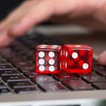 online gambling gambler casino Red Game Dices On Laptop