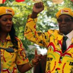 President Robert Mugabe and his wife Grace Mugabe attend a rally of his ruling ZANU-PF party in Harare