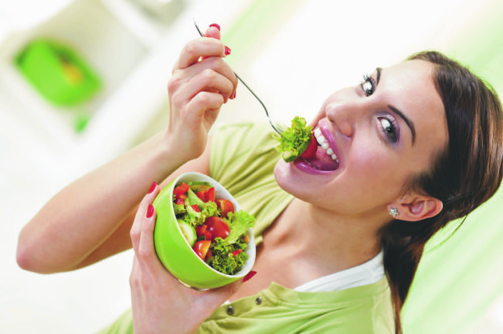 weight woman eating-fruits-and-vegetables_Fotor