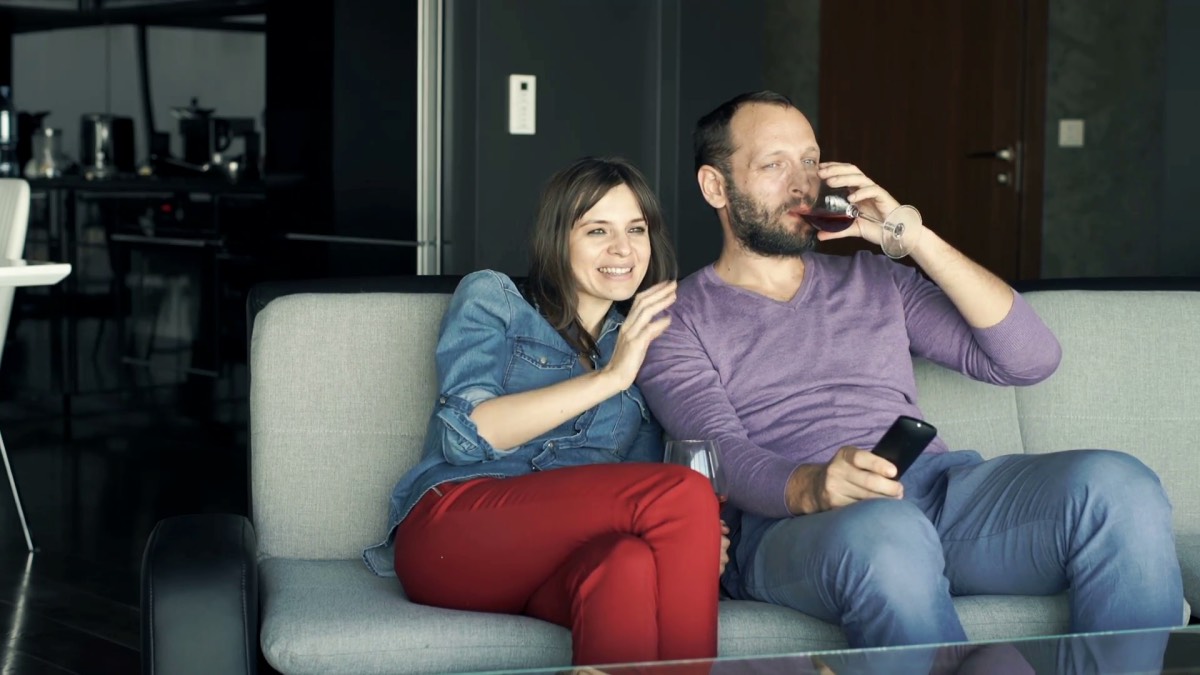 Young couple watching TV love