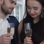 happy couple date young-happy-amorous-couple-with-glasses-of-champagne-on-romantic-date-at-restaurant_4pdcnku9e__F0000_Fotor