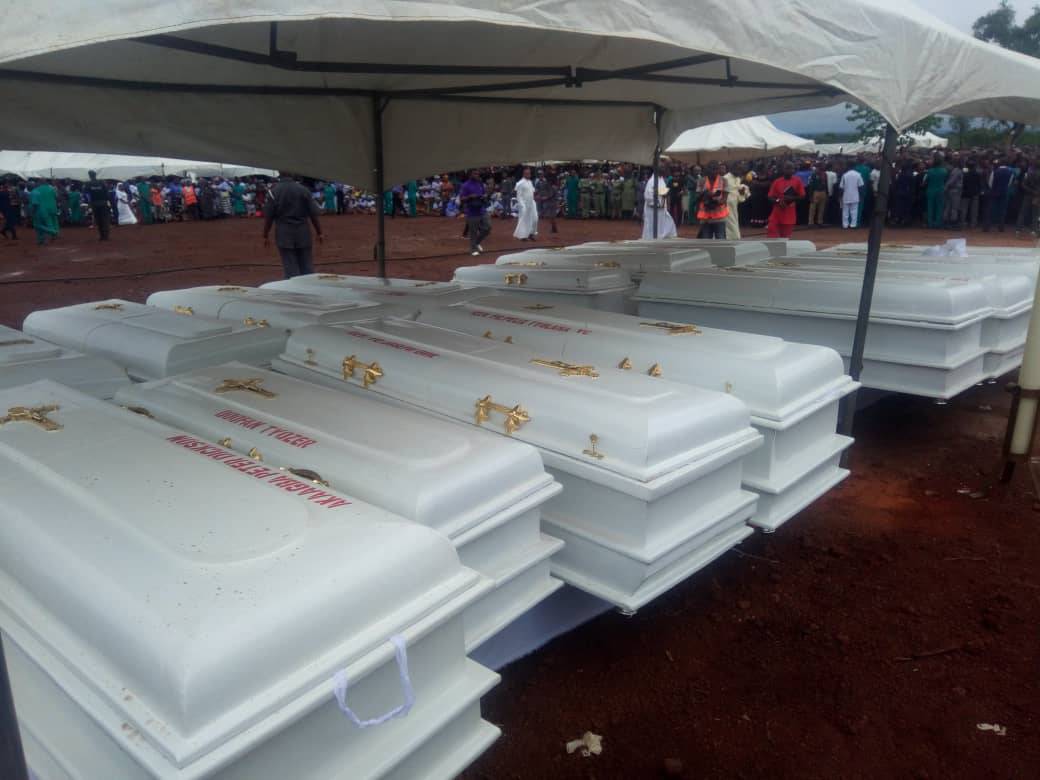 Ash Wednesday Christians Boko Haram Deadlier Caskets of the 2 Roman Catholic priests and 17 parishioners murdered by Fulani herdsmen in Benue on Tuesday, May 22, 2018 in Makurdi as they are given a mass burial| Twitter