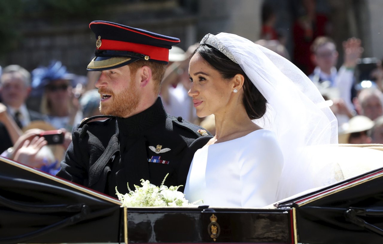 Meghan Markle and Prince Harry leave after their wedding