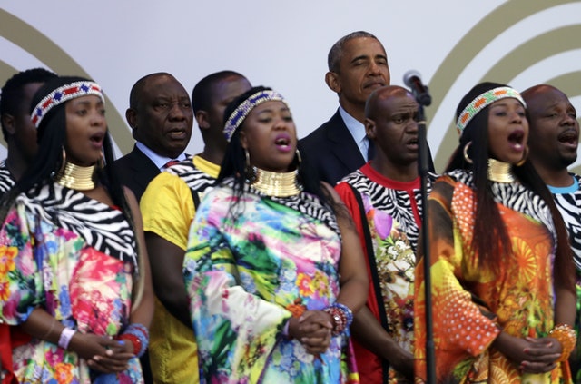 Former US president Barack Obama, back right, with South African President Cyril Ramaphosa, back left | Themba Hadebe/AP