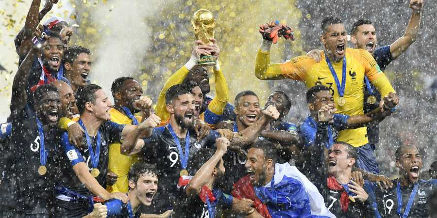 France goalkeeper Hugo Lloris lifts the trophy after France won 4-2 during the final match between France and Croatia