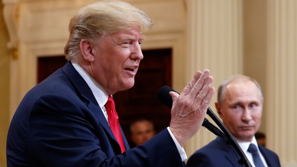 U.S. President Donald Trump speaks with Russian President Vladimir Putin during a press conference after their meeting on July 16, 2018 | AP Photo/Pablo Martinez Monsivais