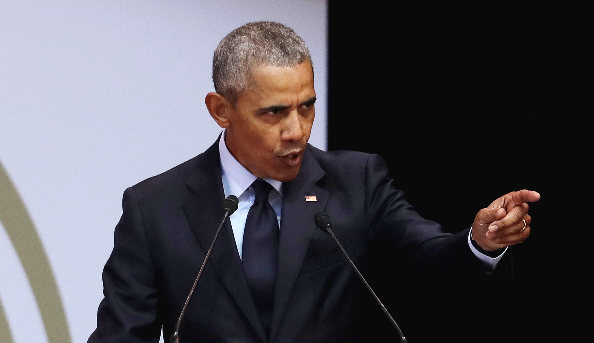 Bombs Former U.S. President Barack Obama, left, delivers his speech at the 16th Annual Nelson Mandela Lecture at the Wanderers Stadium in Johannesburg, South Africa, on Tuesday. (AP Photo/Themba Hadebe)