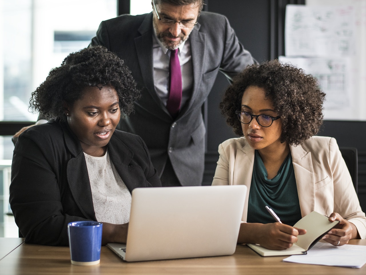 career challenges, monday morning office team work laptop women workplace woman businessman businesswoman