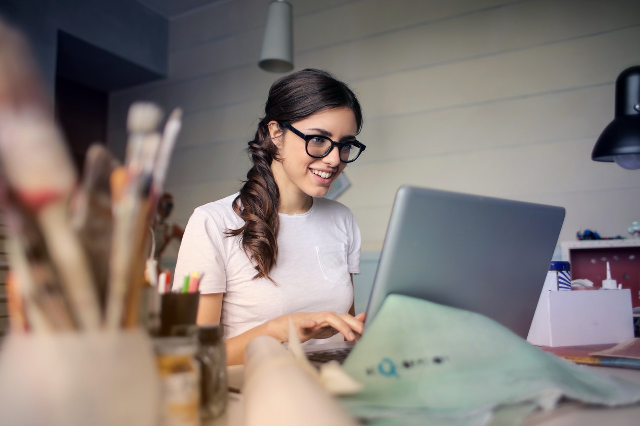 woman office desk laptop