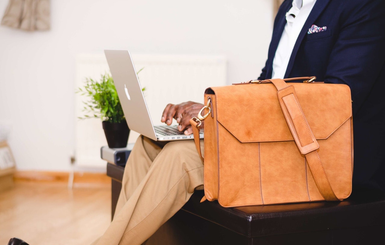 business travel, passport stay healthy man suit laptop fashionable