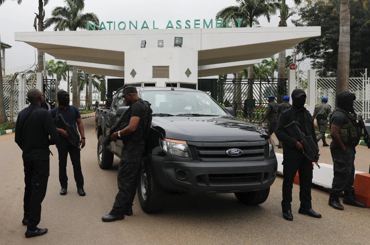 Operatives of the State Security Services, SSS, also known as DSS, stand at the entrance of the National Assembly in Abuja, Nigeria August 7, 2018. | REUTERS/Afolabi Sotunde