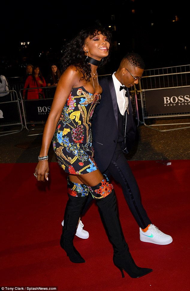 Naomi Campbell made sure she remained in the spotlight as she arrived with Nigerian Singer, Wizkid fashionably late to the 21st annual GQ Men Of The Year Awards 2018, London, on Wednesday, Sep 5, 2018 | Tony Clark/Splash News