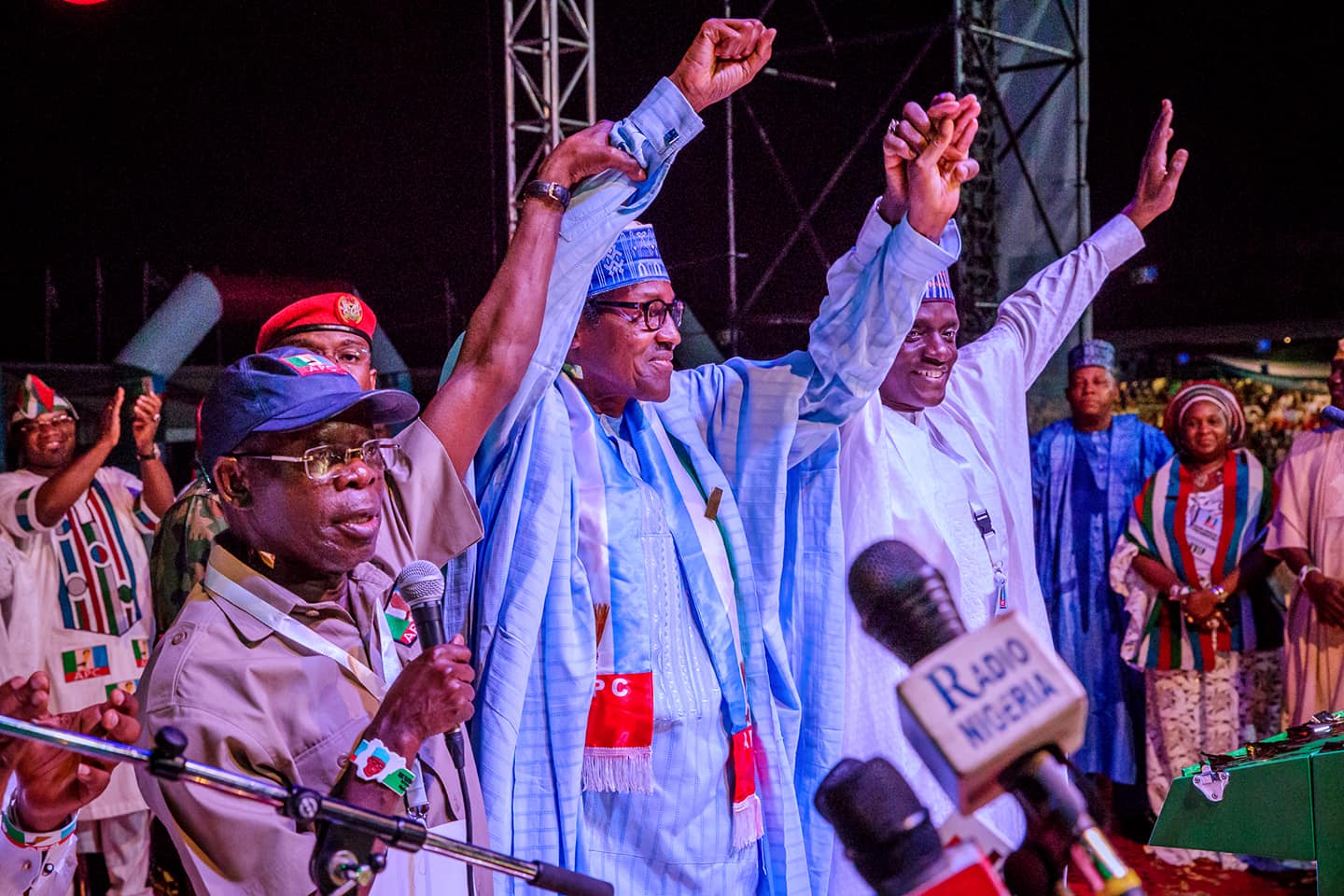 President Buhari with R-L: APC National Chairman Adams Oshiomole and APC National Secretary Maimala Buni as he is declared the Presidential Candidate and Flag bearer of the All Progressives Congress at the APC Presidential National Convention at Eagle Square on 6th Oct 2018