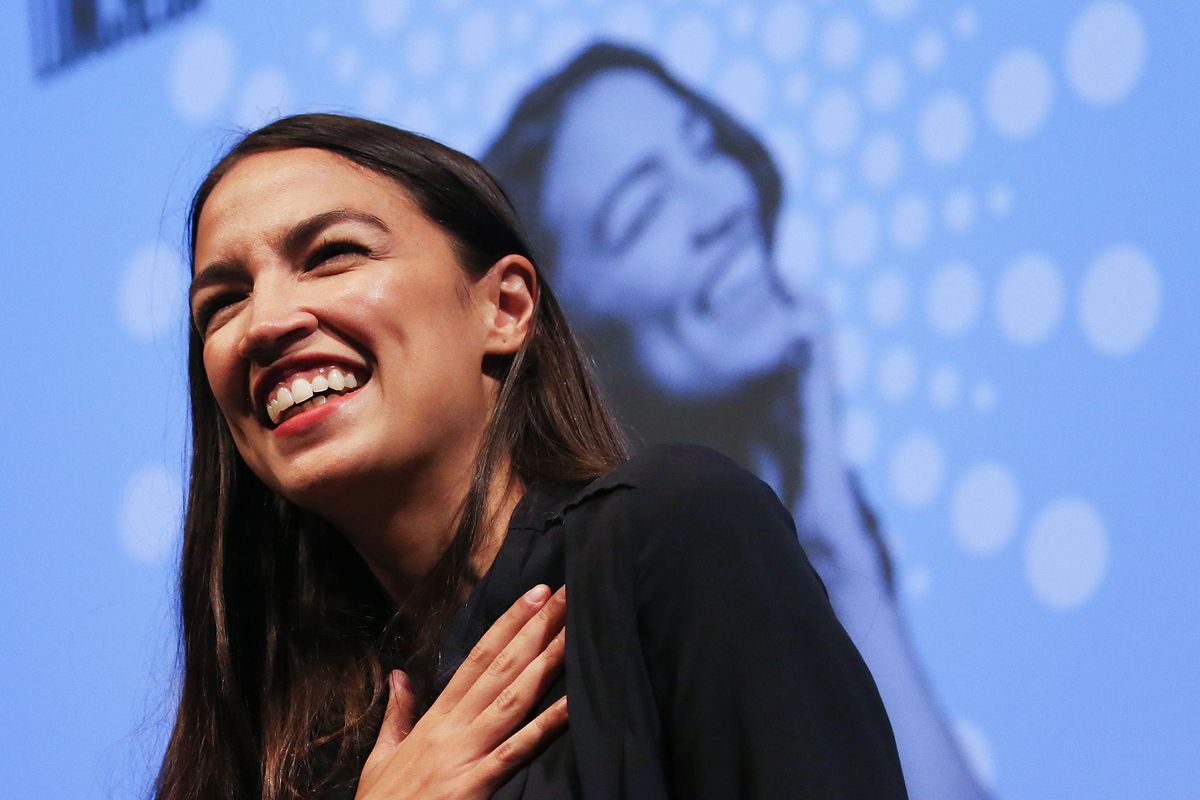 Alexandria Ocasio-Cortez smiles at a progressive fundraiser on August 2, 2018 in Los Angeles. Mario Tama/Getty Images