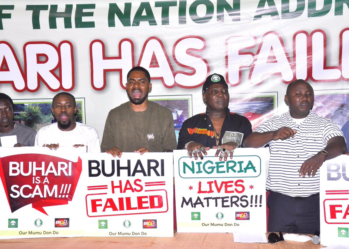 Deji Adeyanju (2nd left), the convener of Concerned Nigerians and one of the leaders of Our Mumu Don Do Movement at a protest in 2017