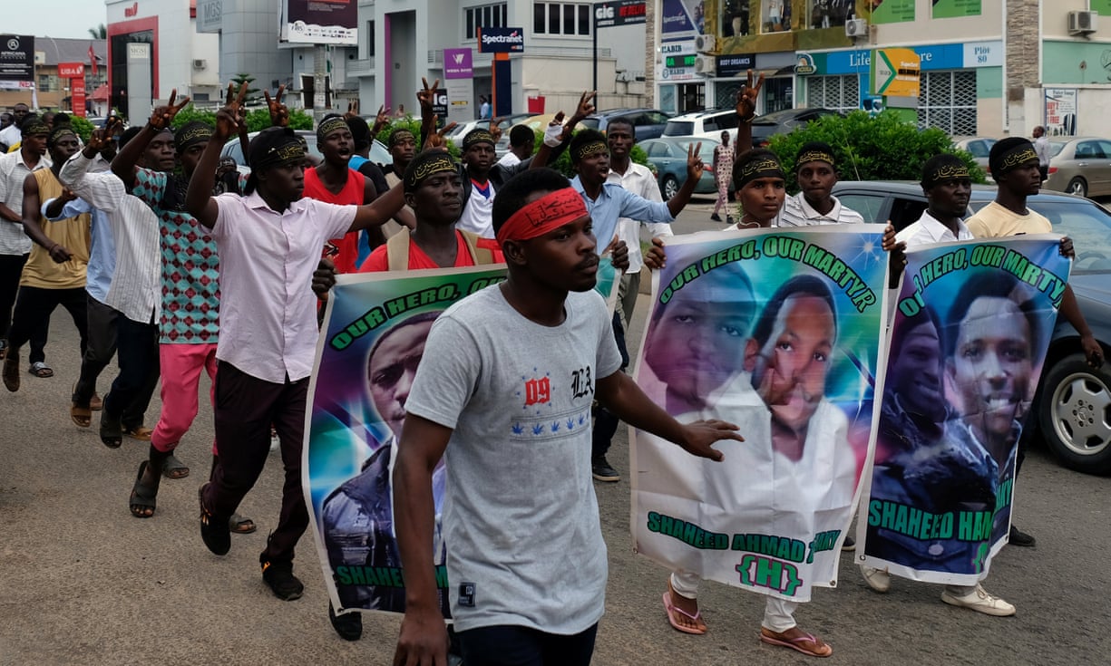 Shi'ite Shiite protestors marching to the Nigeria’s capital city Abuja. Nigerian army officers have killed at least 10 Shiite protesters