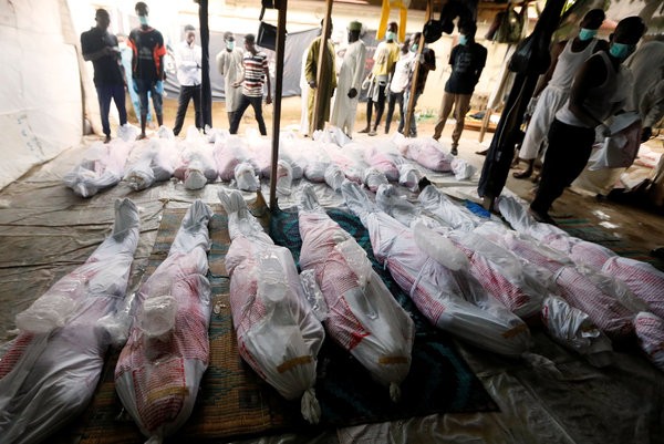Members of the Islamic Movement of Nigeria preparing the bodies of members killed when the Nigerian Army opened fire during the group’s protests in the capital Abuja this week.CreditCreditAfolabi Sotunde/Reuters
