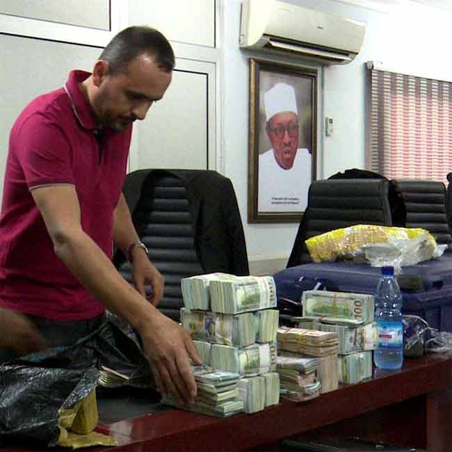 The suspect, Abbas Lakis, at the Abuja Airport on November 30, 2018 | EFCC Photo