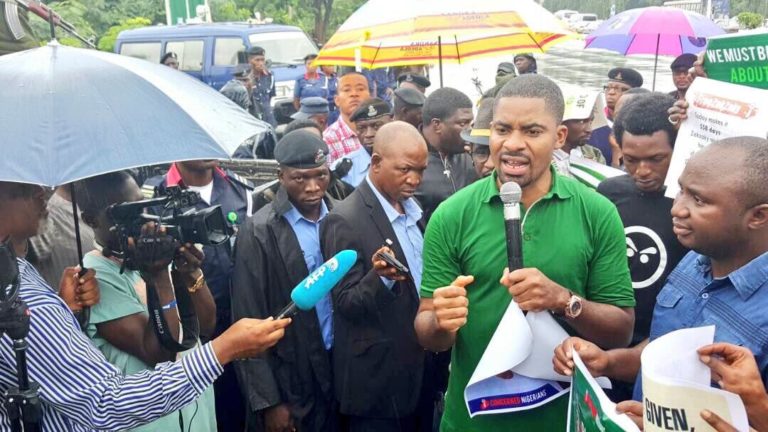 Deji Adeyanju (2nd left), the convener of Concerned Nigerians and one of the leaders of Our Mumu Don Do Movement at a protest in 2017