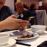 woman-paying-bill-with-wireless-credit-card-terminal-at-chinese-restaurant_nkpy72wy__F0000