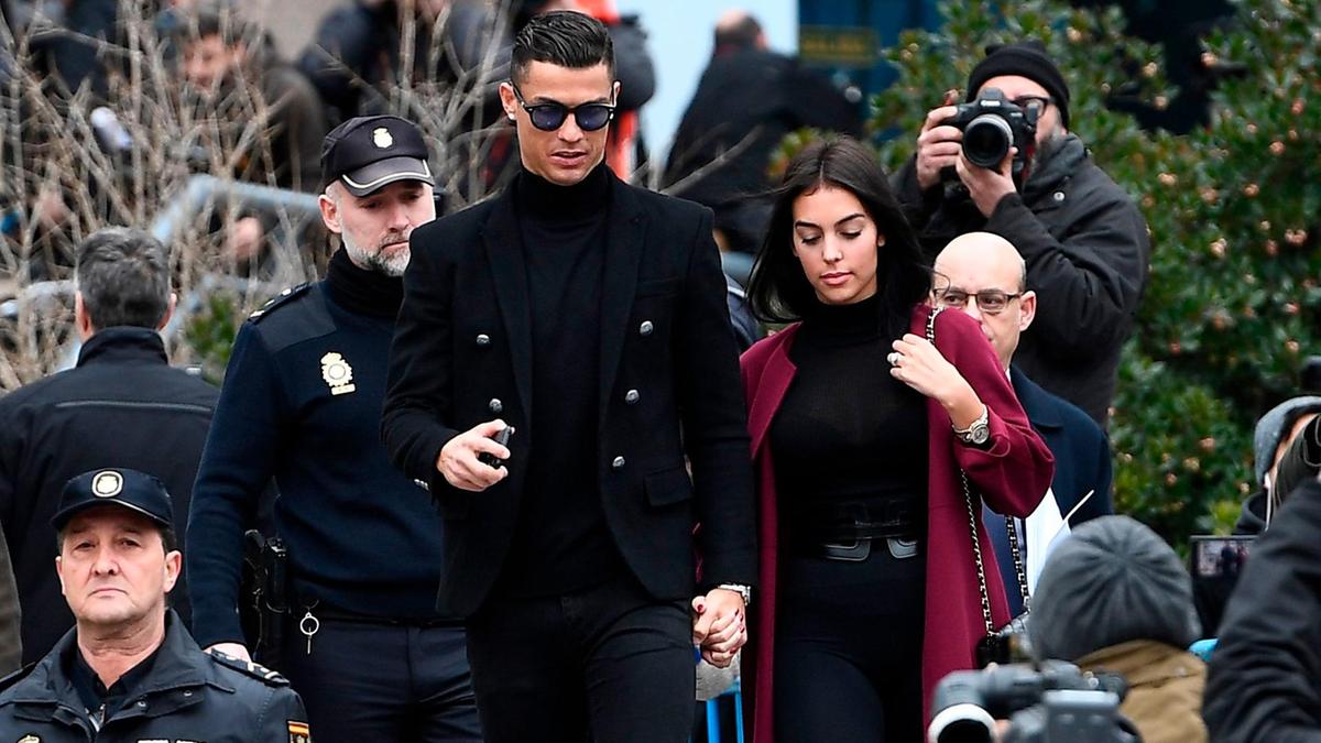 Cristiano Ronaldo leaves court following his hearing into tax fraud. AFP