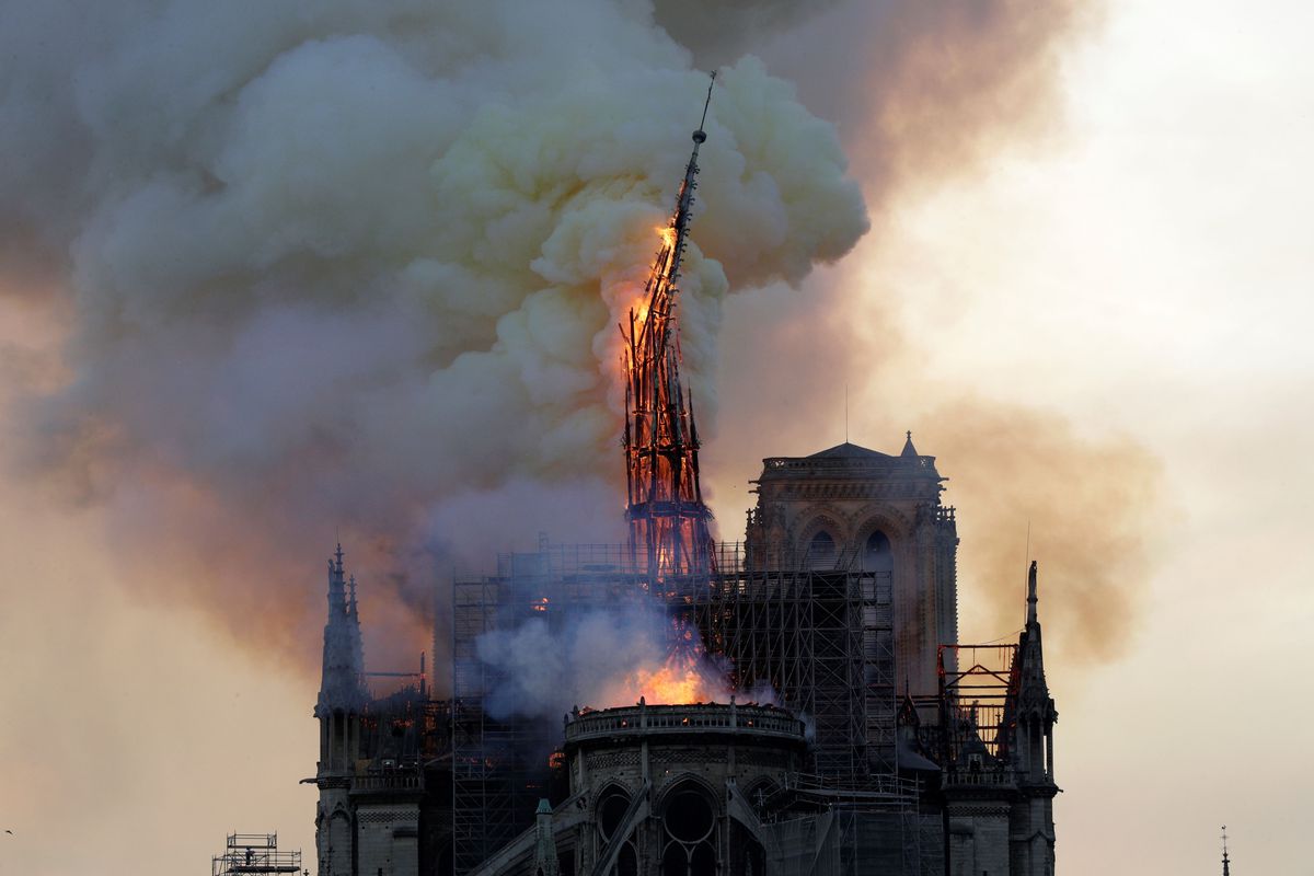 The steeple of the Notre Dame Cathedral in central Paris collapses on April 15, 2019. AFP/Getty Images