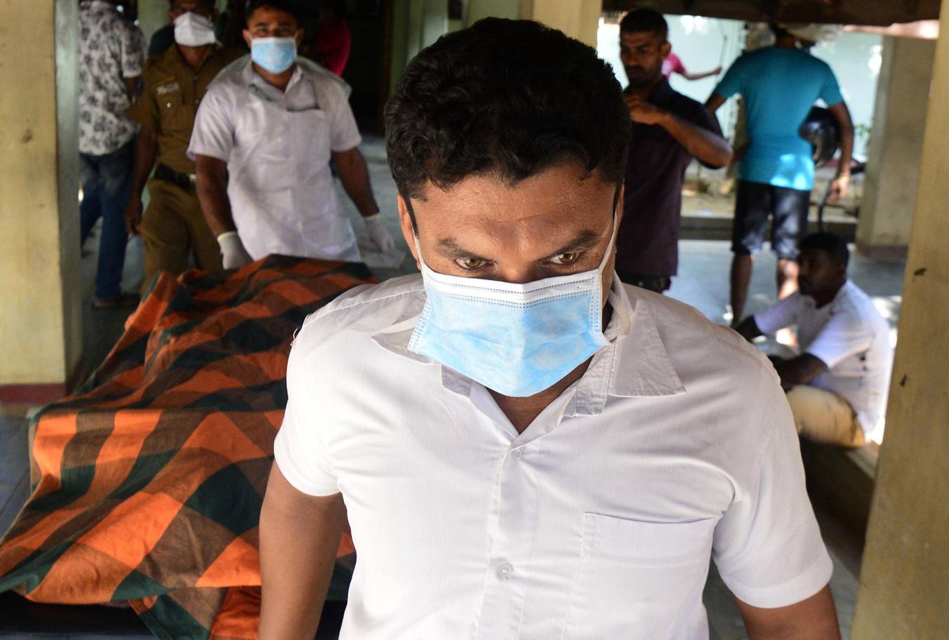 Medical response team work to remove dead bodies from the scene of bombings in Sri Lankan capital Colombo AFP/Getty