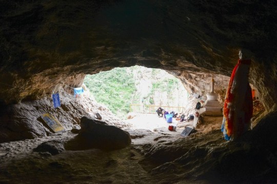 Baishiya Karst Cave, where the jawbone was discovered, is at an altitude of 3,280 metres (10,760 feet). A view of the cave where the bones were found (Picture: PA) 