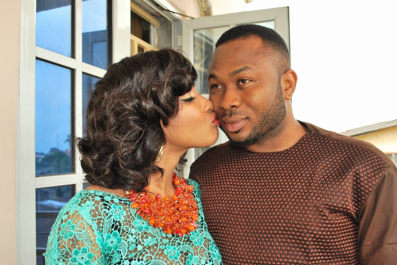 Tonto Dikeh kisses her then husband, Olakunle Churchill, an alleged ritualist and internet fraudster, when the going was good