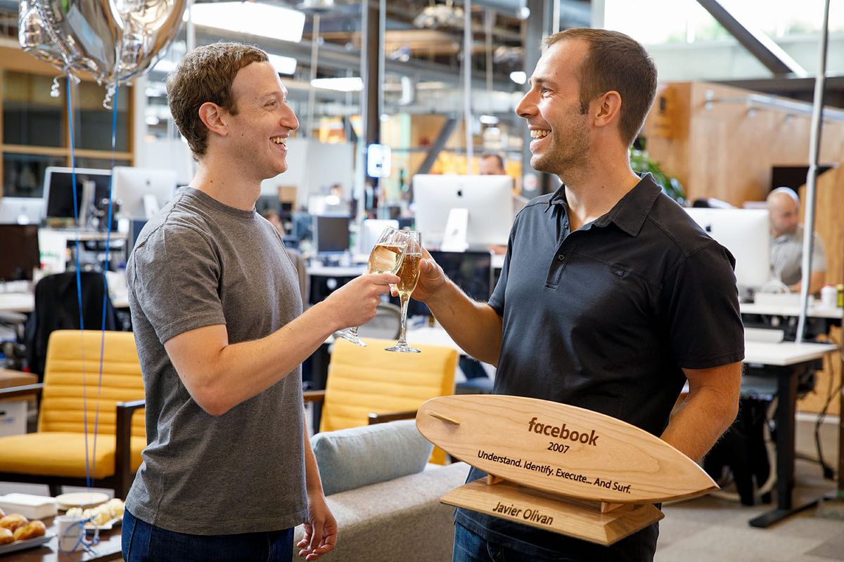 Facebook founder, Mark Zuckerberg with an engineer in the company