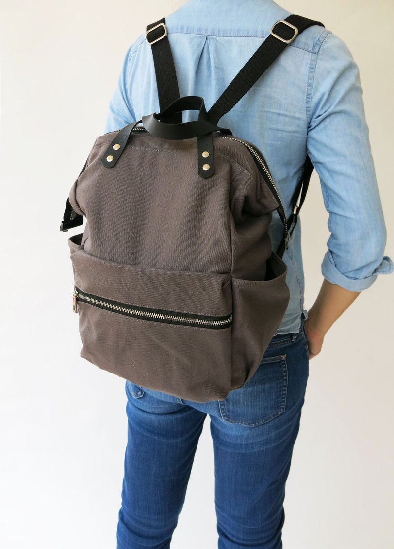 travelling mom dad father  baby backpack