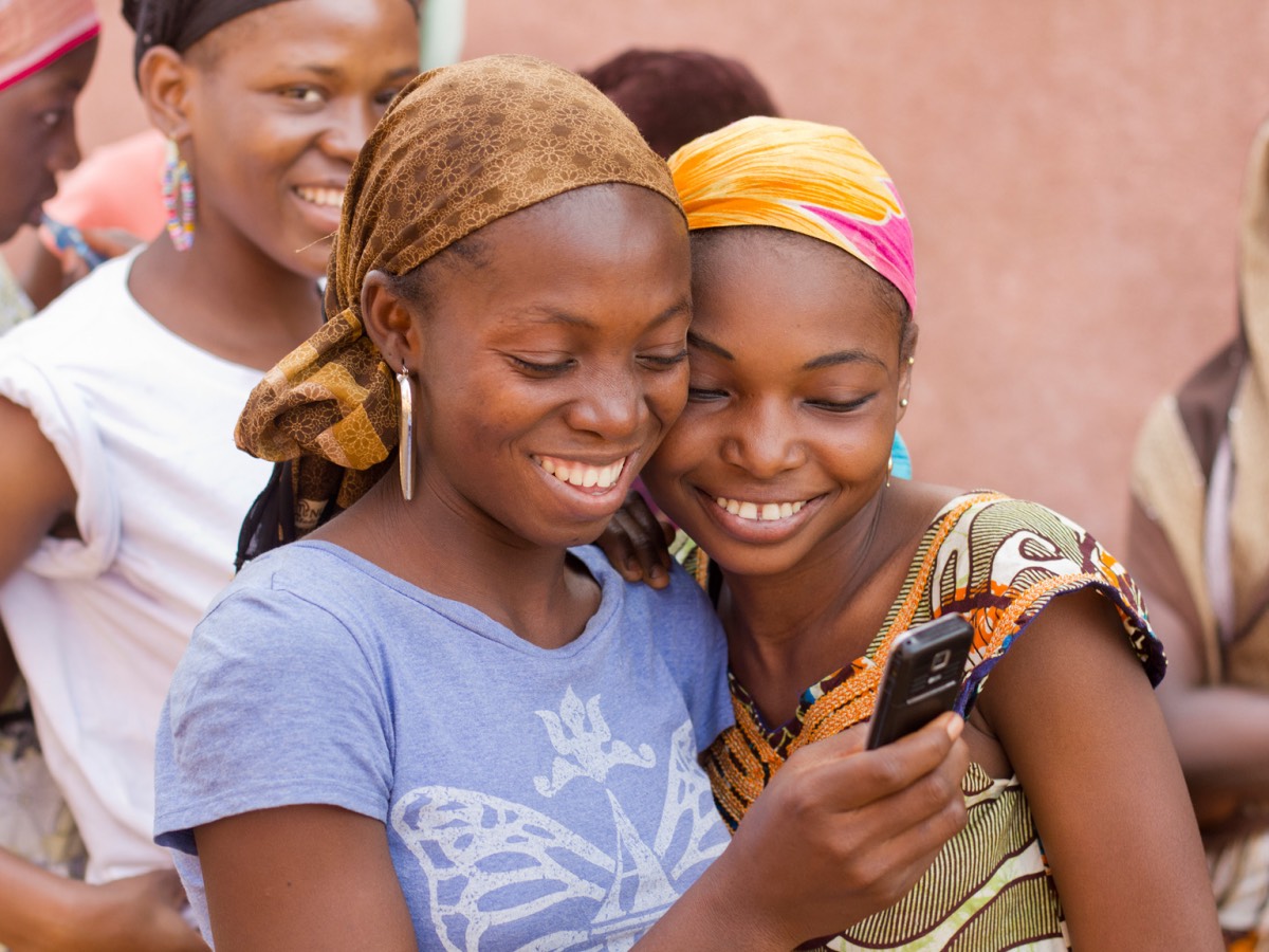 African youth using the internet on a smart phone. Photo Source: MGI Africa Lions 2013