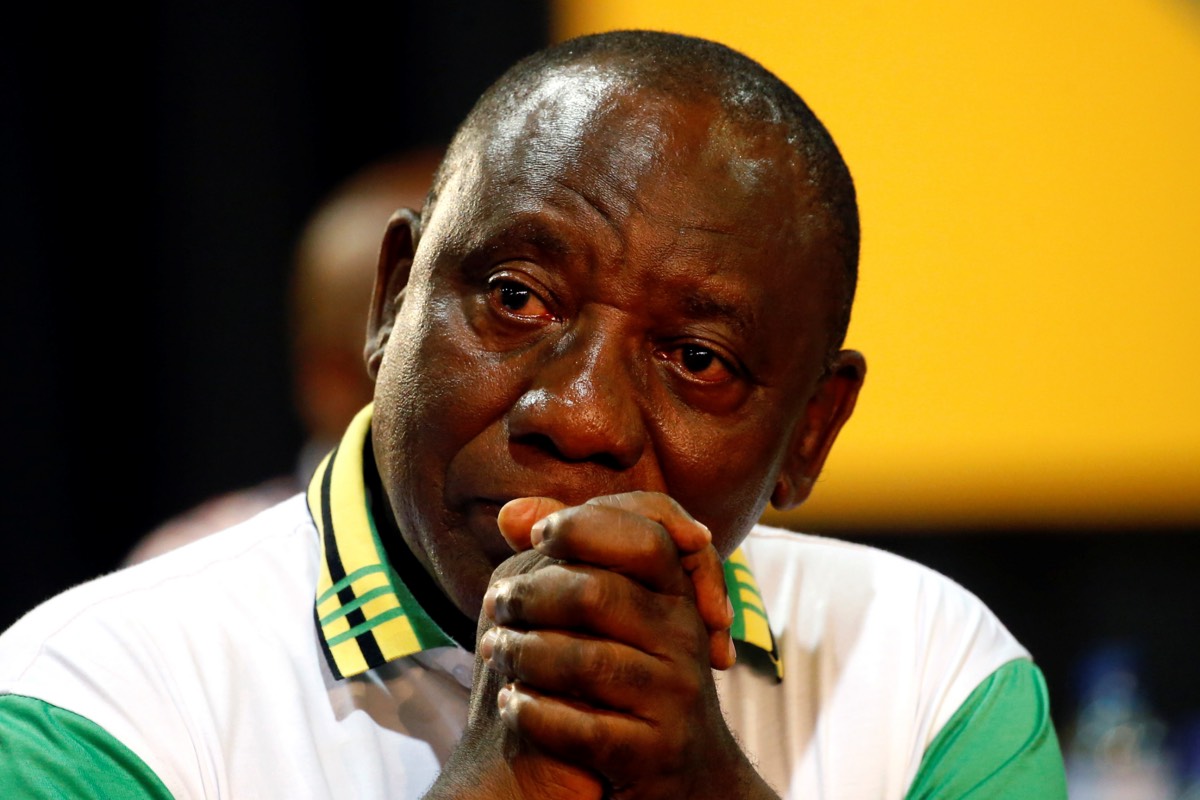 President of South Africa Cyril Ramaphosa reacts after he was elected president of the ANC during the 54th National Conference of the ruling African National Congress (ANC) at the Nasrec Expo Centre in Johannesburg, South Africa December 18, 2017. REUTERS/Siphiwe Sibeko - RC1289F77440