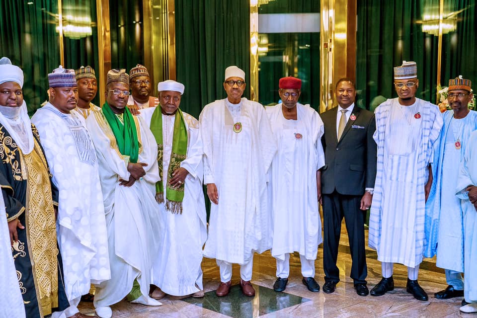 President Buhari with Shaikh Muhammad Lamin Inyas and other leaders as he receives in audience Leaders of Tijjaniyya Movement in State House on 25th Nov 2019 | State House Photo